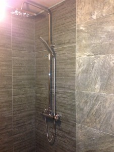 Rain shower bathroom fitting