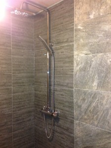 Rain shower bathroom fitting