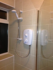 Shower over the bath with hidden water pipe