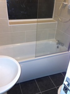 New Fitted bathroom with bath and sink