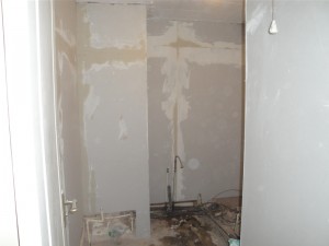 Board the bathroom walls before tiling