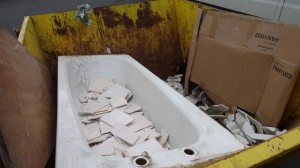 Bathroom waste in the skip