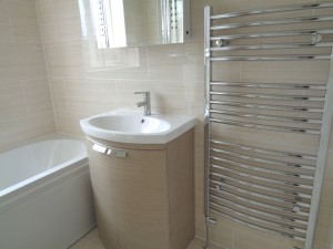 Travistock Basin and Towel Warmer Fitted in a Bathroom