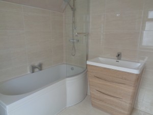 Light Oak Vanity Basin and P Shaped Shower Bath