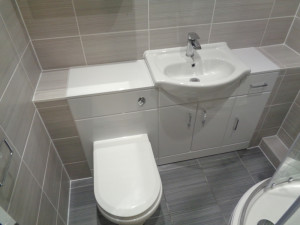 Bathroom Storage with built in Basin Toilet and Cupboard vanity units