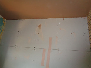 Bathroom walls boarded and ceiling plastered