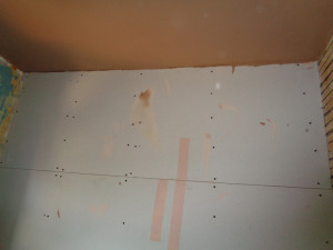 Bathroom walls boarded and ceiling plastered