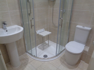 Disabled bathroom with quadrant curved shower