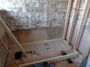 Bathroom Studded wall with hidden water pipes 