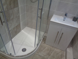 Quadrant Shower with White Vanity Storage Basin
