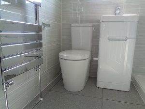 Towel Warmer Easy Clean Toilet and Grey Tiles