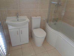 P shaped shower bath, toilet and vanity basin