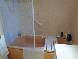 Bath in bathroom before refit in Coventry home
