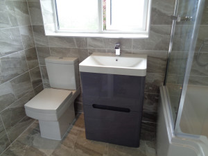 Bathroom Tiled with Stone Effect Grey wall and Floor Tiles