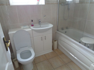 Coventry Bathroom with Combination Vanity Basin Toilet and Bath