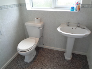 Bathroom in Stratford Upon Avon house, toilet and basin