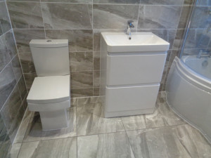 Grey Stone effect Floor and Wall tiles with White Bathroom Suite