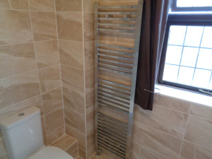 Bathroom Towel Warmer and Hidden tiled pipe work