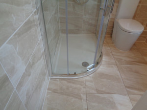 Shower tray 1200mm x 800mm quadrant shower tray fitted to the floor