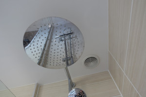 Large Shower Head and Ceiling Mounted Extractor Fan