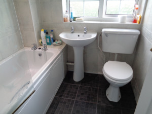 Original Bathroom with Bath, Basin and Sink in home in Warwick