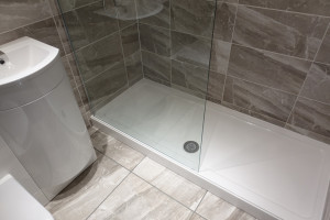 Walk In 1700cm stone resin shower tray and fixed glass shower screen