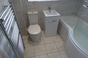 Chrome towel warmer fitted in Bathroom