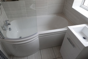 Modern Fully Tiled walls and Floor Bathroom