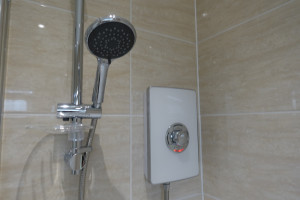 White triton Triton aspirante electric shower Fitted on tiled Bathroom Wall