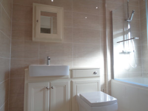 Matching bathroom wall cabinet and vanity basin