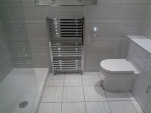 Mobility Shower Room With Fully Tiled Walls and Floor