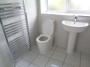 Exhall Rd Coventry Bathroom renovation with towel warmer, toilet and pedestal basin