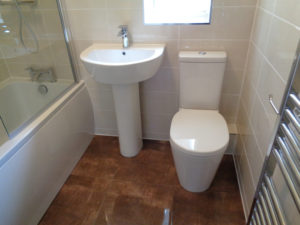 Straight Bath, shower screen, pedestal basin and toilet