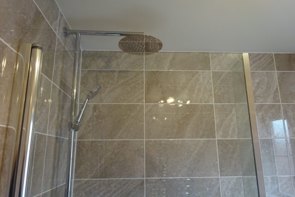 Coventry Bathrooms » British Ceramic Tile Light Grey Travertine effect