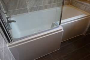 L shaped shower bath fitted in Bathroom in Coventry