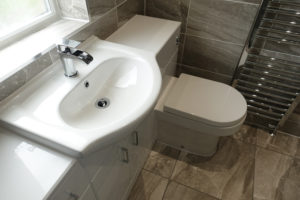 Wall to wall fitted bathroom furniture
