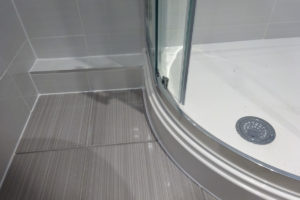 Bathroom water and waste pipes boxed in and hidden