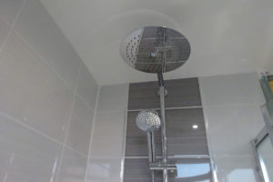 Thermostatic wall mounted shower
