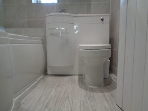 Bathroom with wood effect ceramic floor tiles Spring Hill Bubbenhall Warwickshire