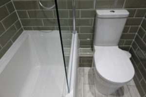 Bathroom with contemporary bath and shower screen