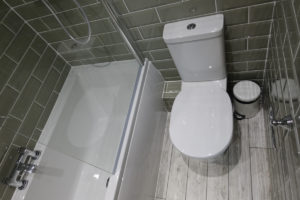 Bathroom with contemporary bath and toilet