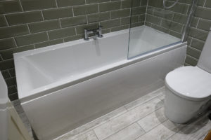 Traditional bathroom with contemporary bath and bath taps