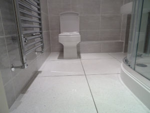 Chrome bathroom towel rail warmer with chrome heating pipes