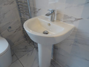 Bathroom with pedestal basin 