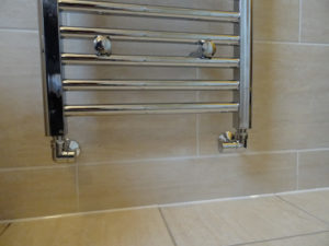 Chrome Towel Warner Fitted on Shower Room Wall