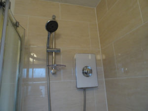 Triton Electric Shower Fitted On Shower Wall Coventry