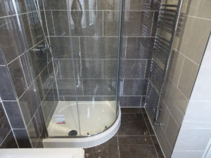 Bathroom with fitted quadrant shower