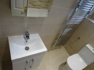 Basin toilet and chrome towel warmer fitted bathroom rugby