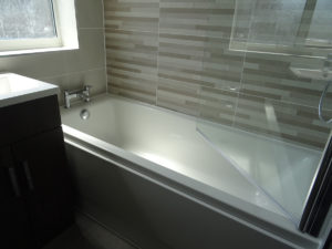 Bathroom in Coventry tiled with Feature tiled wall