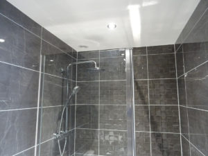 Chrome thermostatic shower fitted in an ensuite